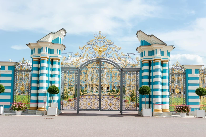 a beautiful decoratively designed blue and white gate