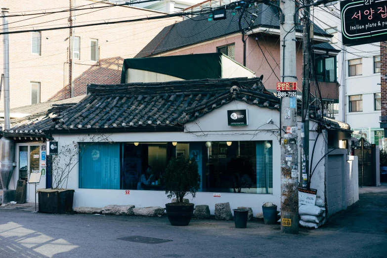 an older building with the sun shining down on it