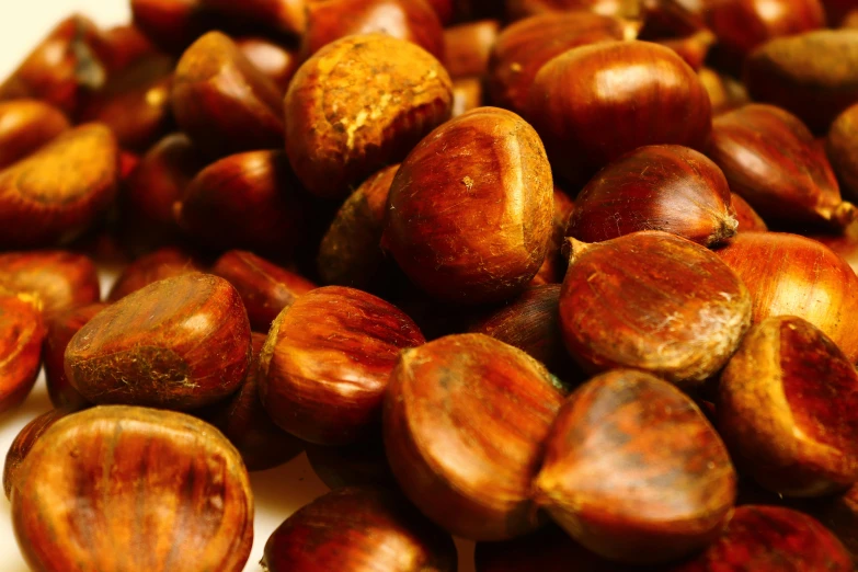 a pile of nuts sitting on top of a table