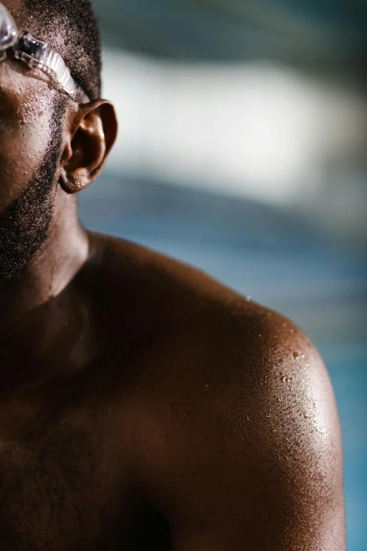 a man with a piece of swimming equipment on his head