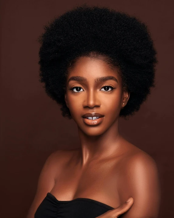 an african woman with big black hair