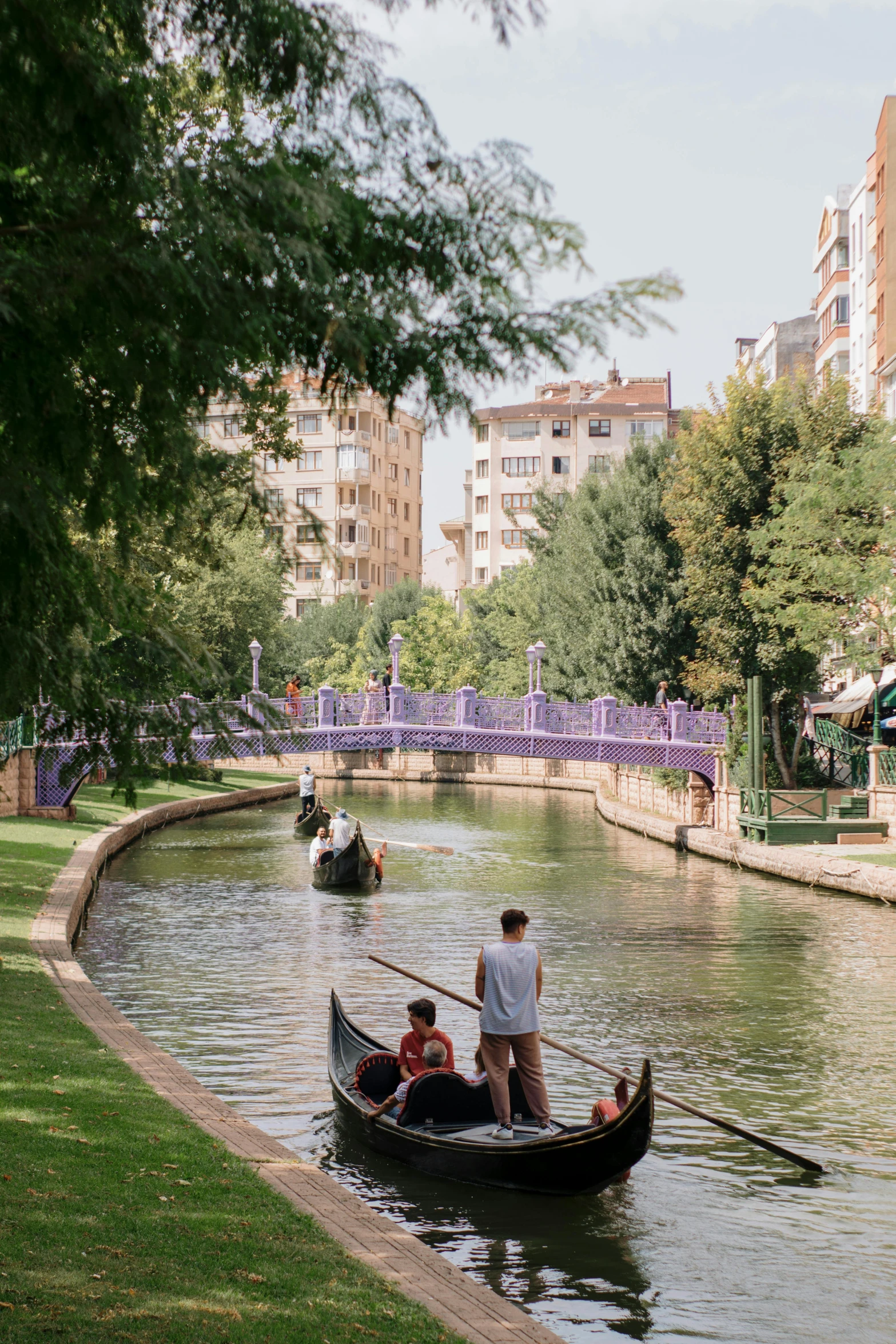 two men are riding a boat in the water