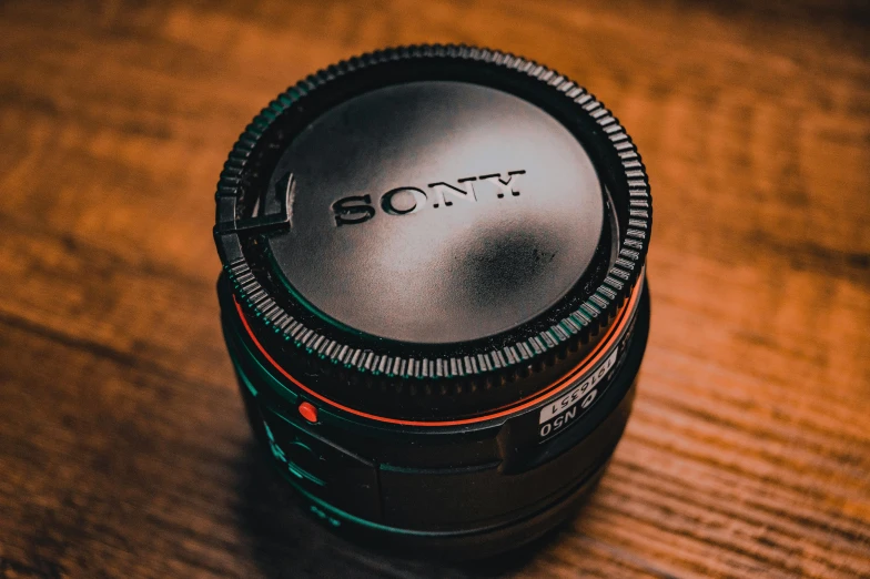 a sony lens sitting on top of a table