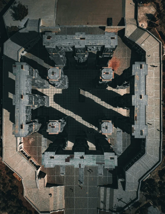 an aerial po of a large building with two floors and one door