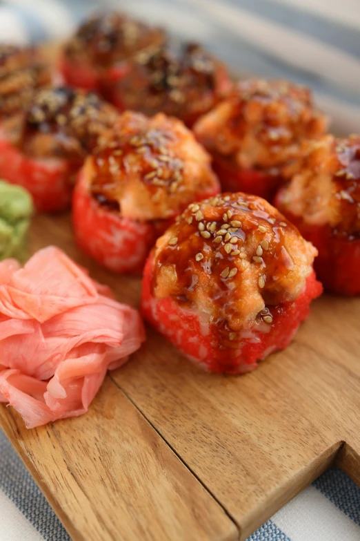 a wooden  board with pieces of food