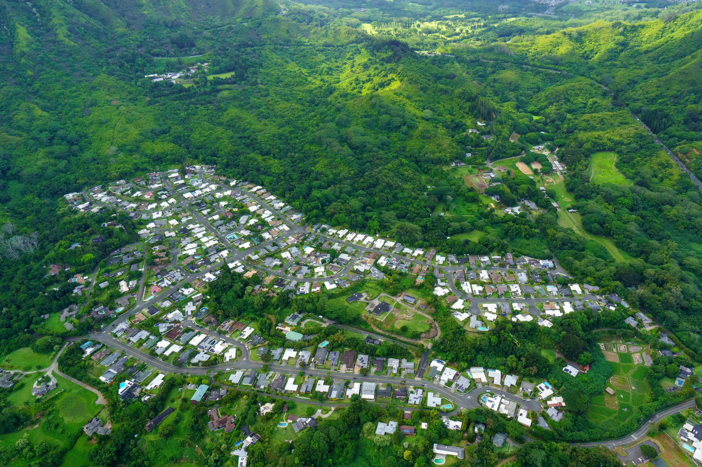 a small village in a lush green valley