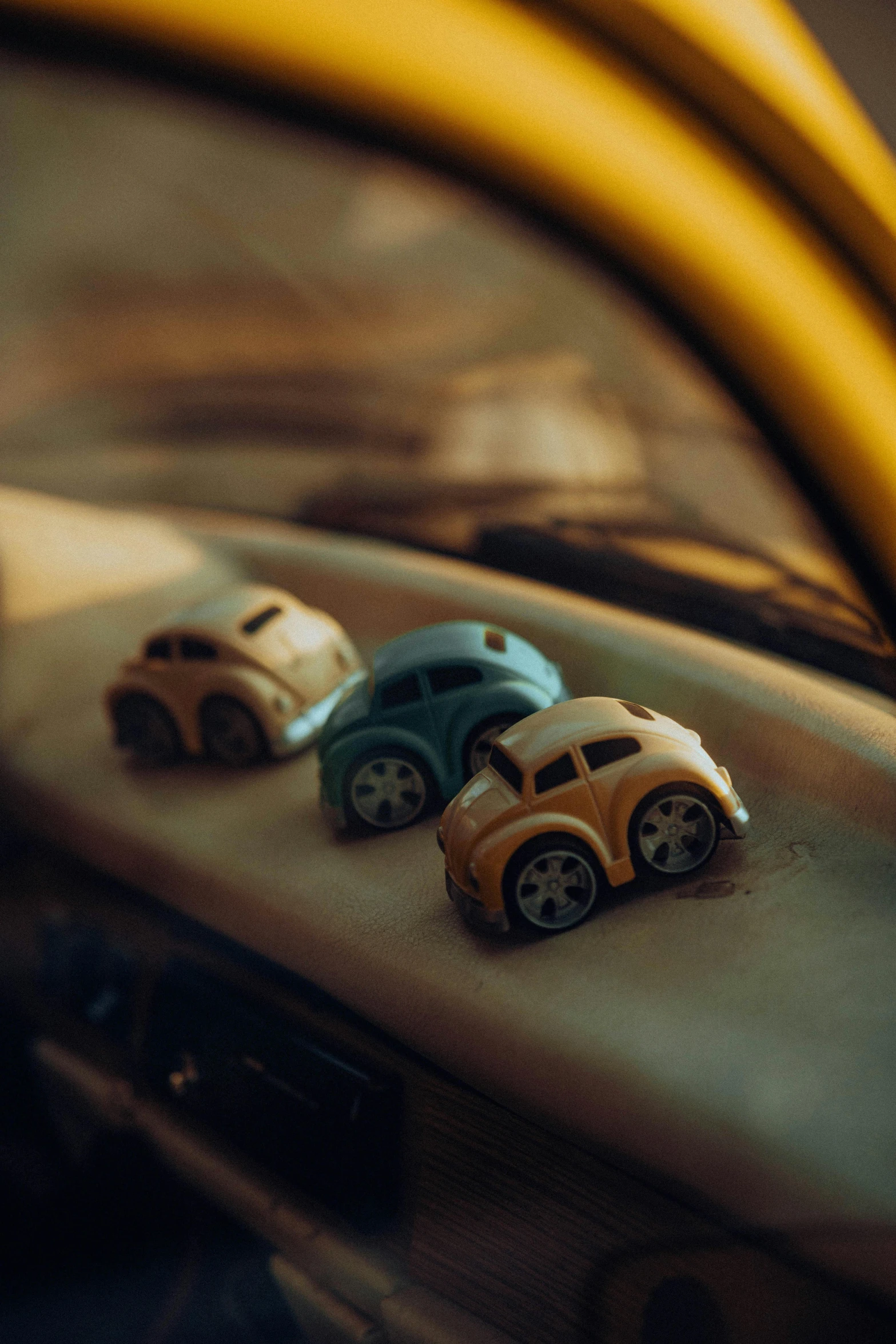 some toy cars that are sitting on a table