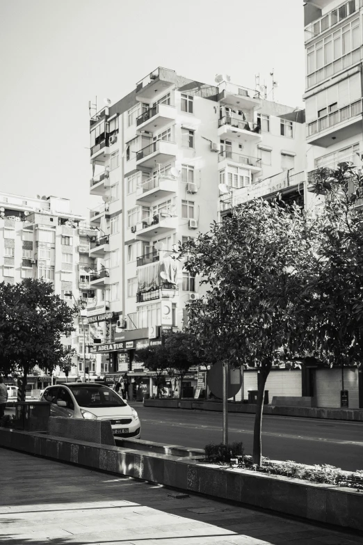 a black and white picture of a city street