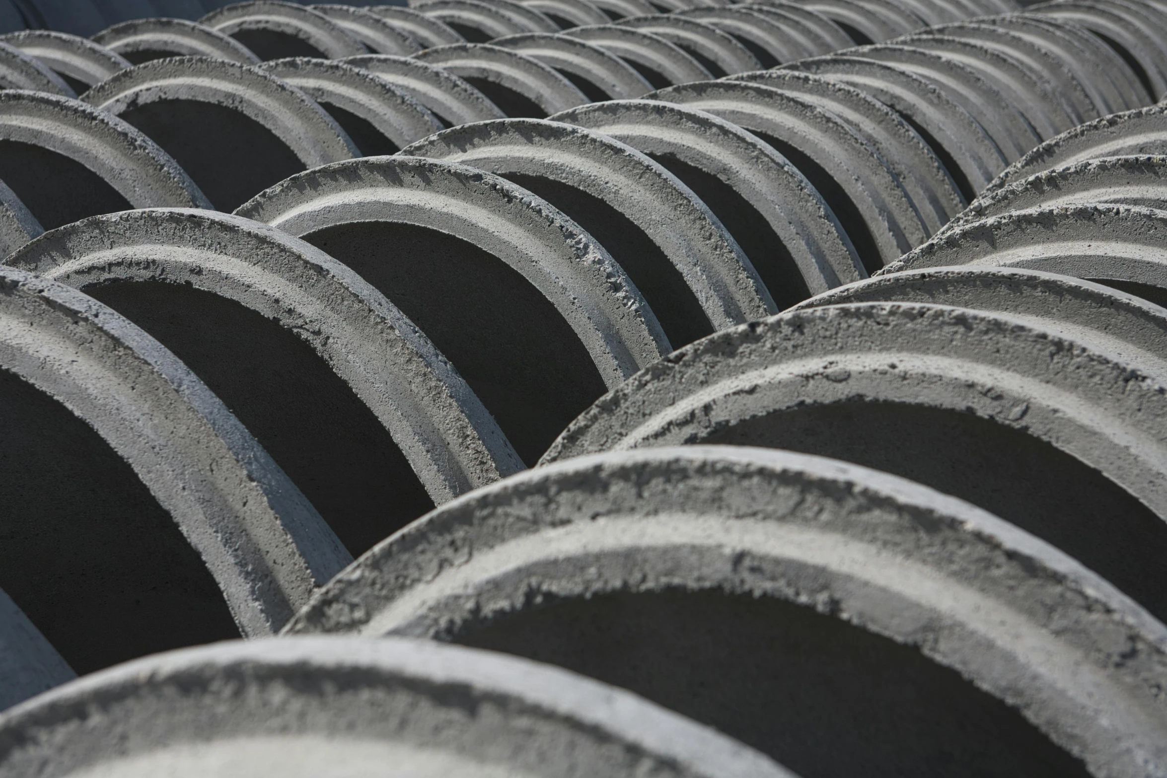 the cement circle are lined up together in a row