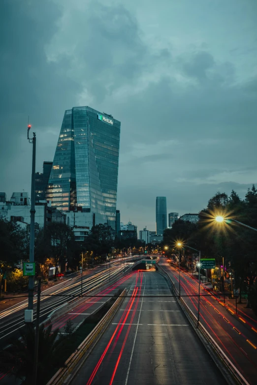 city at night with traffic moving in both directions