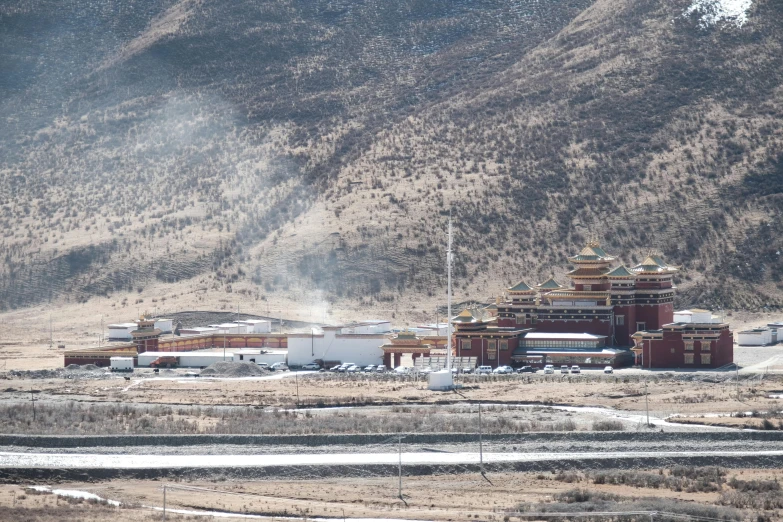 a very large building on the side of a mountain