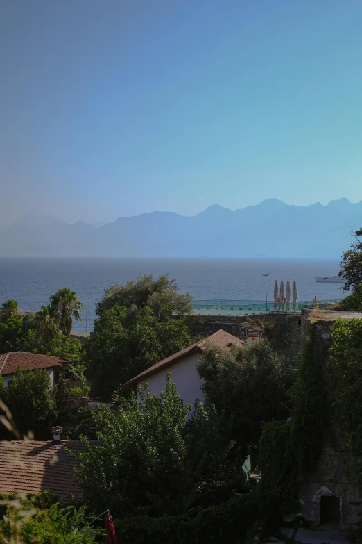 a view from the top of a house overlooking the water