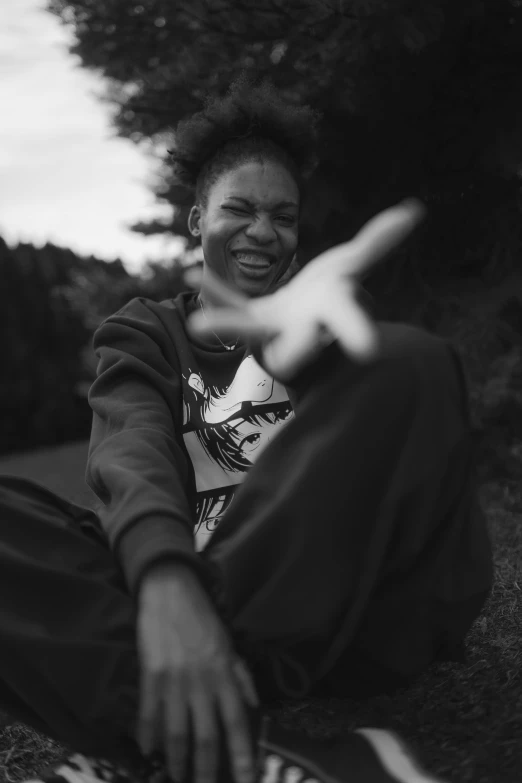 black and white pograph of a person laughing