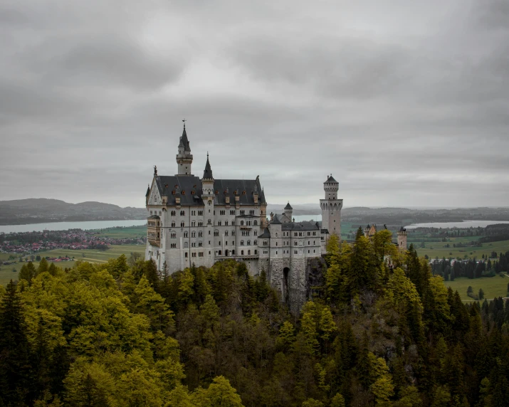 a very large castle in the middle of the countryside