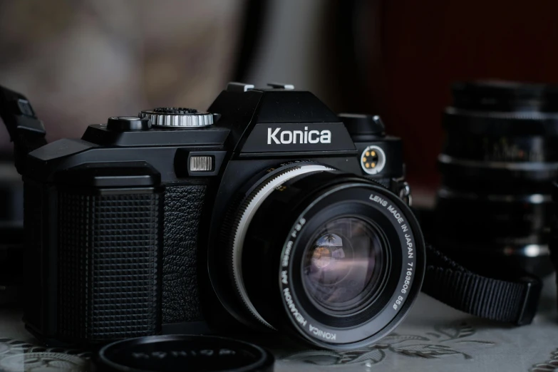 a camera on top of a table with its lens up