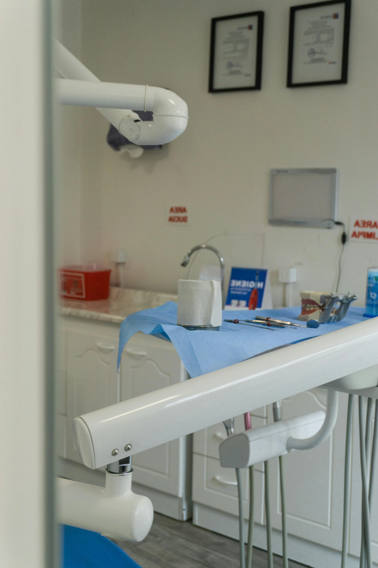 a room with dental equipment and a towel