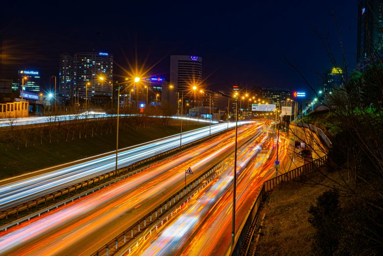 city traffic and streaks of light at night