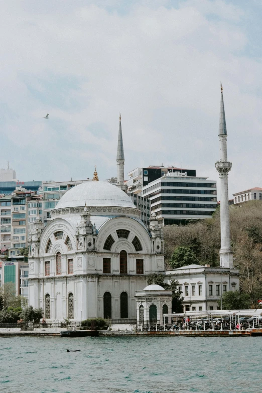 a view of a building from across the water