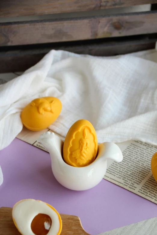 an egg shell and an open shell on a table