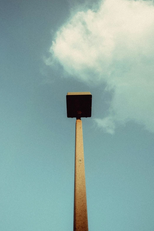 a sky view from below of an obelisk