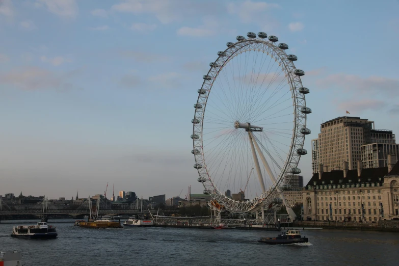 a huge ferris wheel sitting in the middle of water