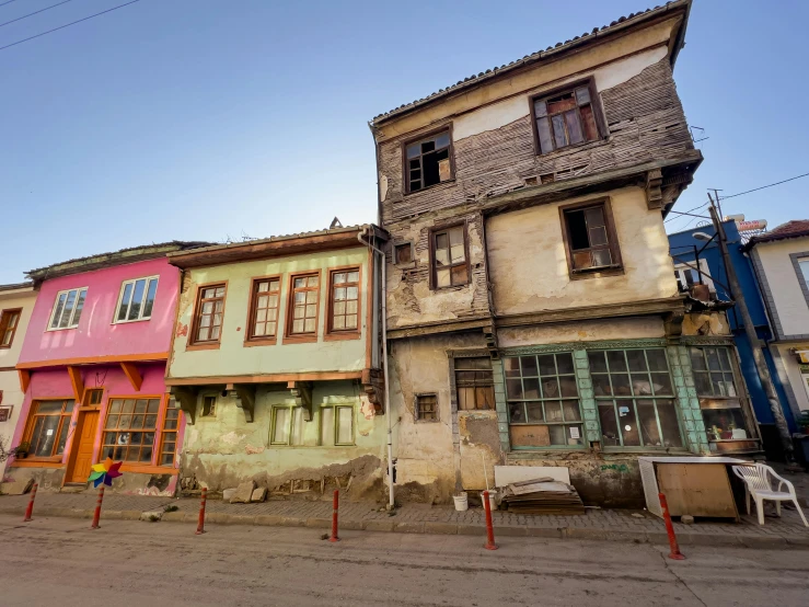 a couple of houses sitting next to each other