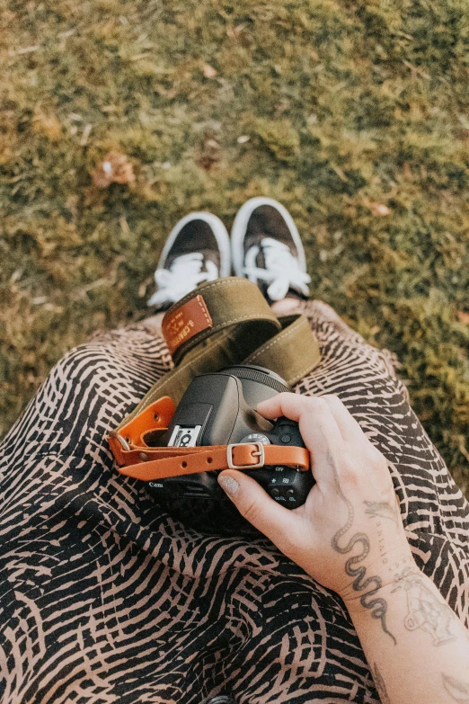 a person holding a cell phone in their hand