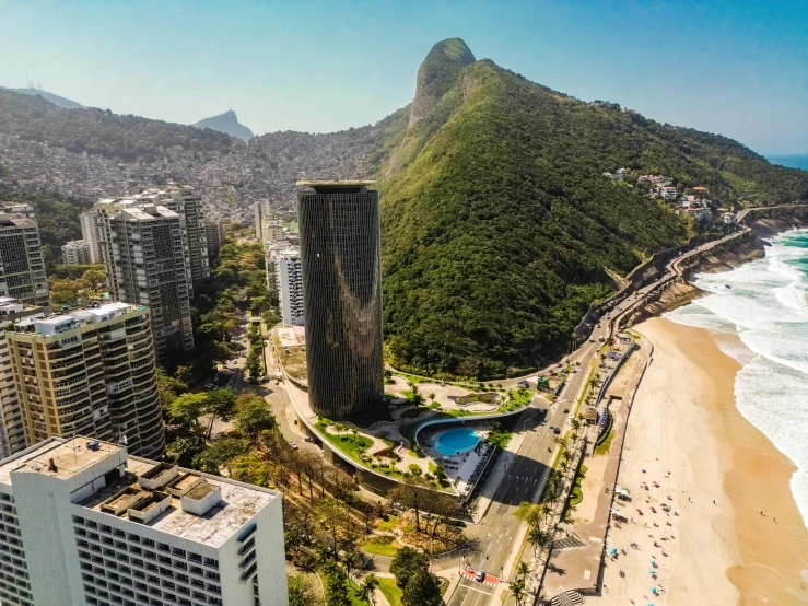 an aerial view of the beach and city from high above