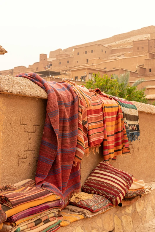 a couple of towels on top of a wall