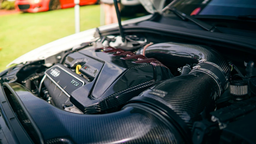 a car with an engine installed and the hood up