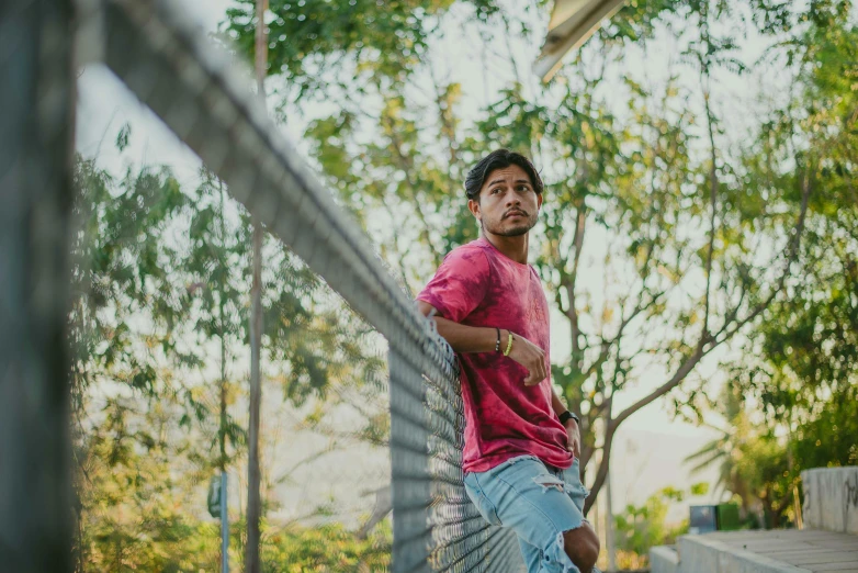 a man walking down some stairs while wearing sneakers