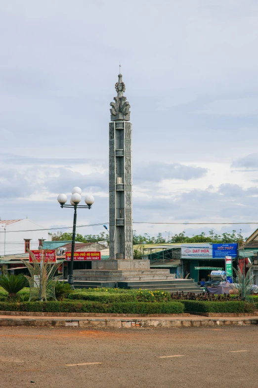 a large tower with some signs on the side of it