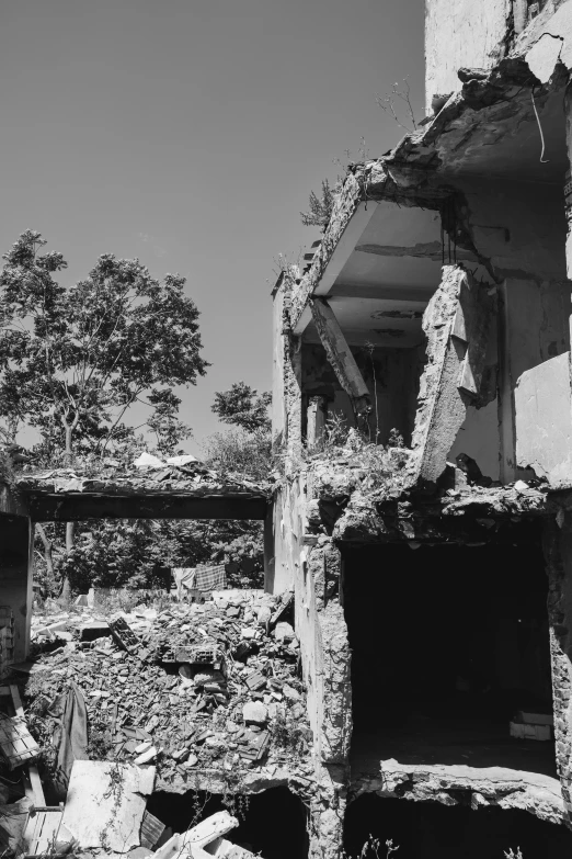 an old stone building with broken windows