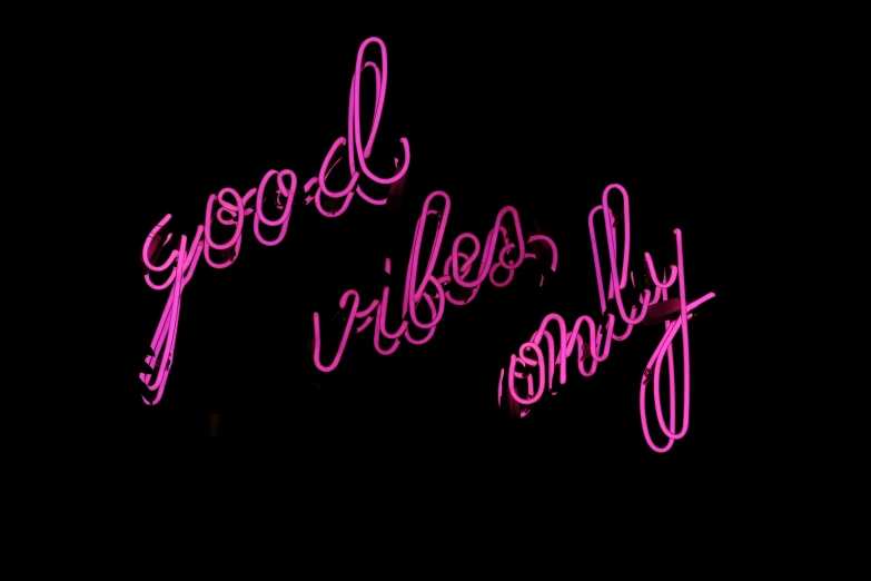 a neon sign on a black background says goodbye