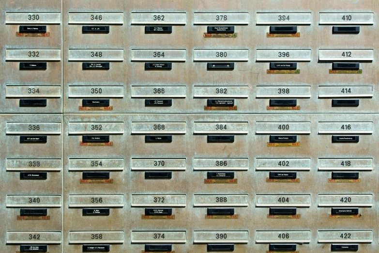 an array of old mailbox numbers with different letters