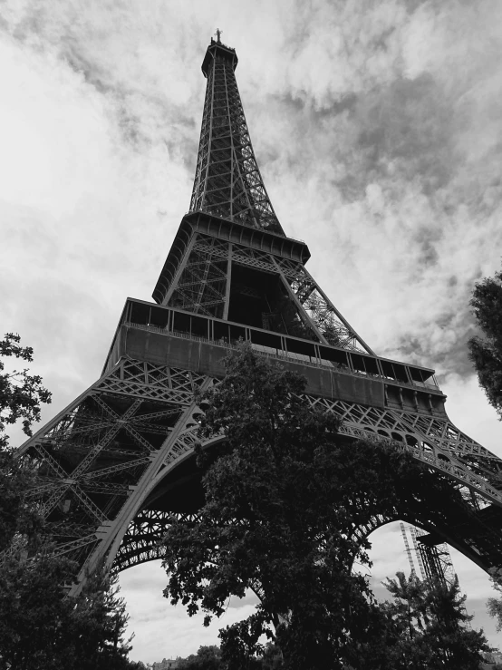 black and white image of the eiffel tower, paris