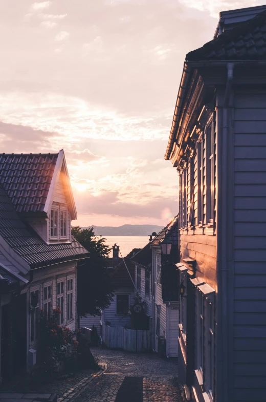 an old street leading to an older home