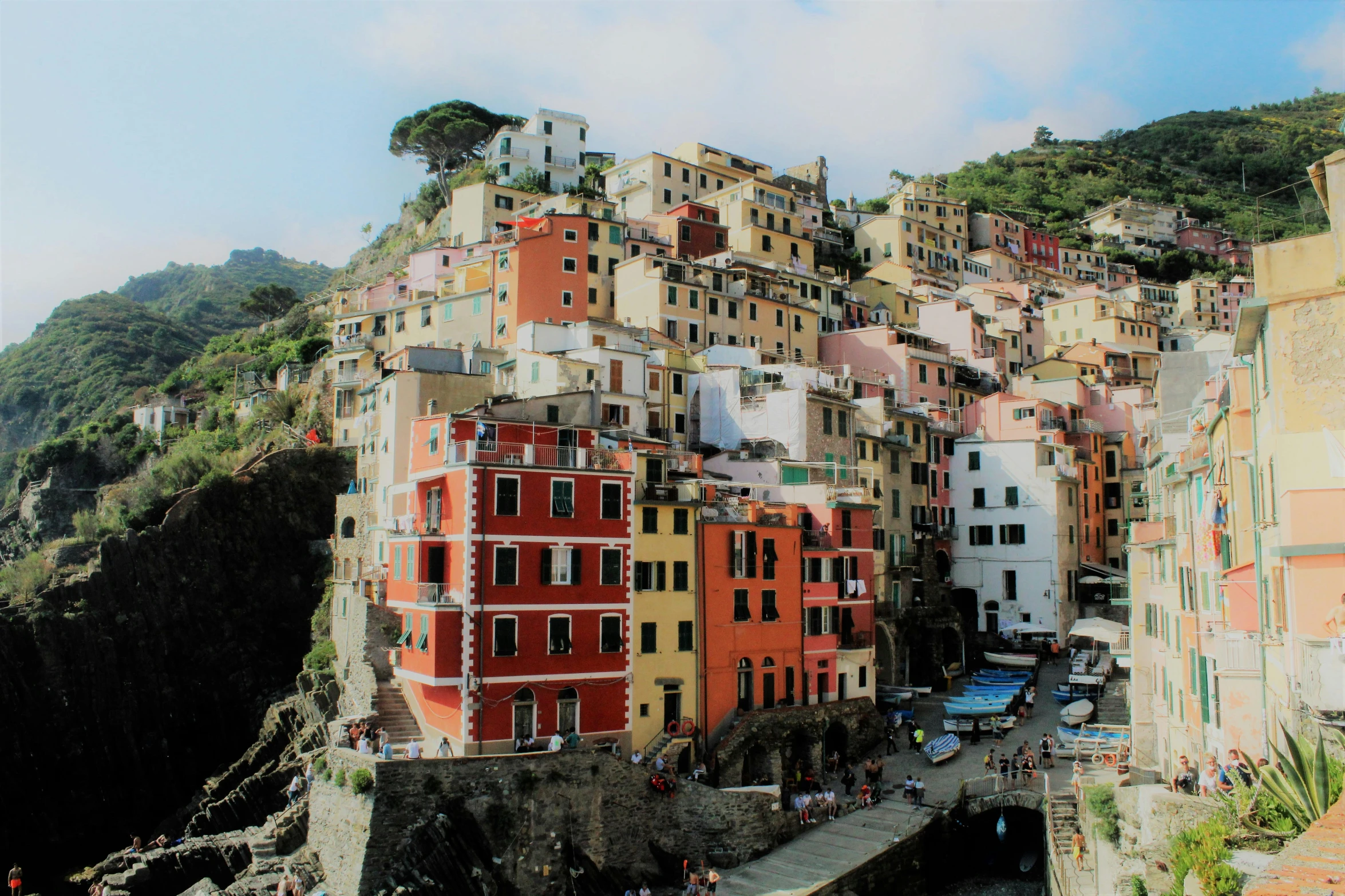 some buildings have colorful facades on the top of them