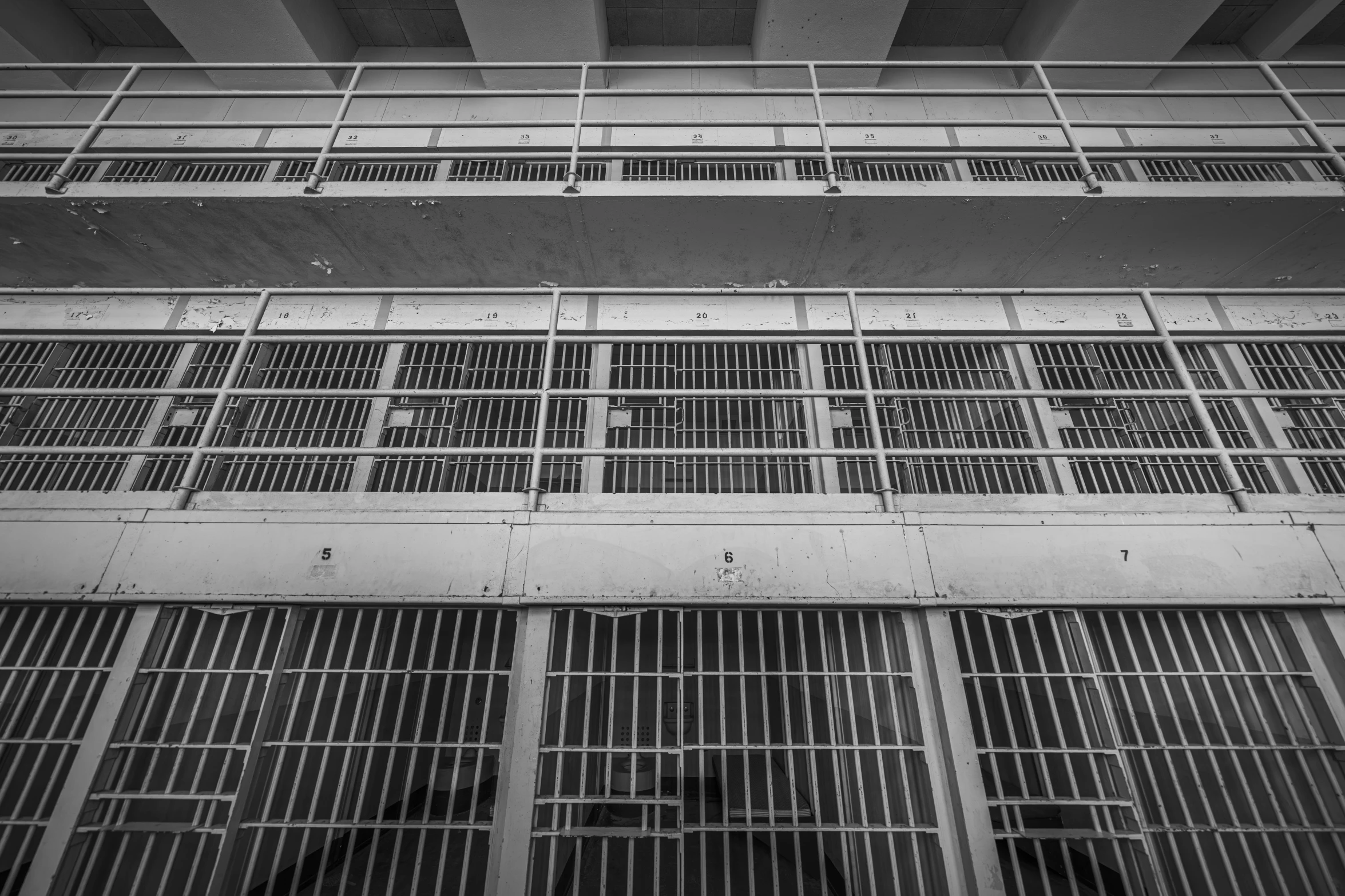 a large metal building with barred windows and bars on it