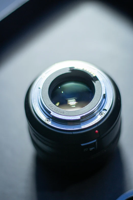 a close up of a camera lens on a table