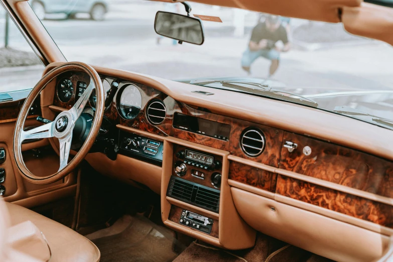 an interior view of a car shows the dashboard and dash lights