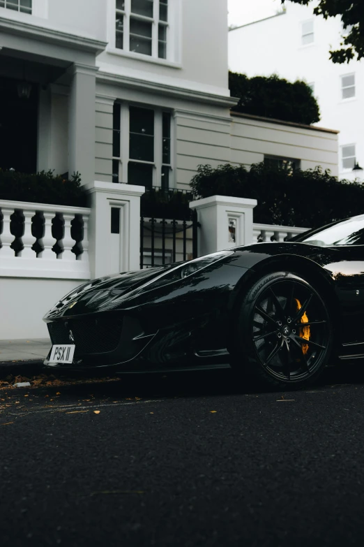 the bugatti supercar parked on the side of the street