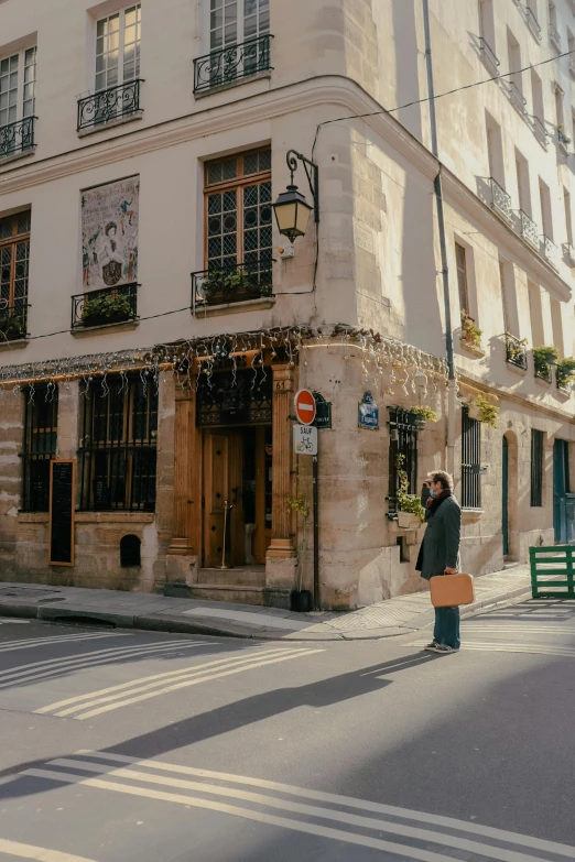 a person is looking at a building with decorations