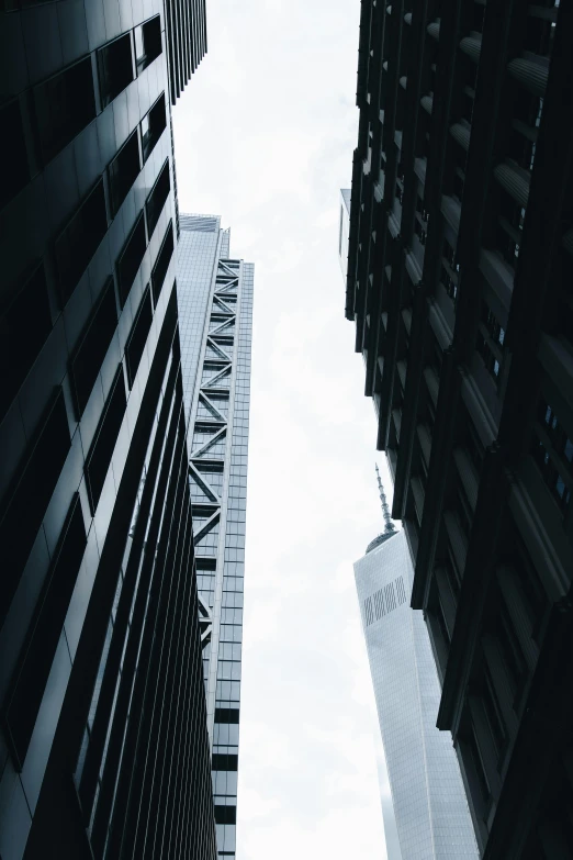 the back of two tall buildings in a city