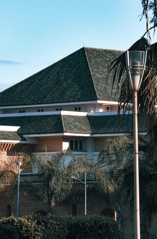 this po shows the top portion of a large house with three stories