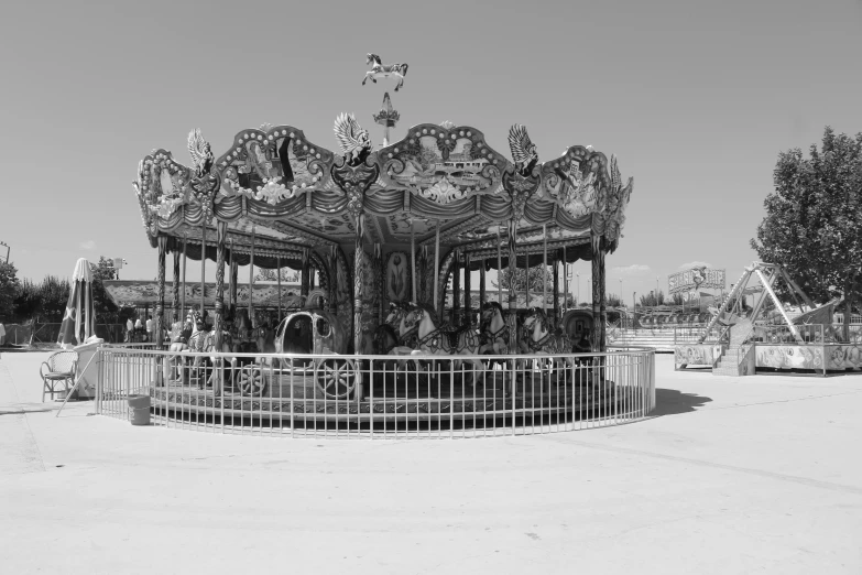 a merry go round in the middle of a park