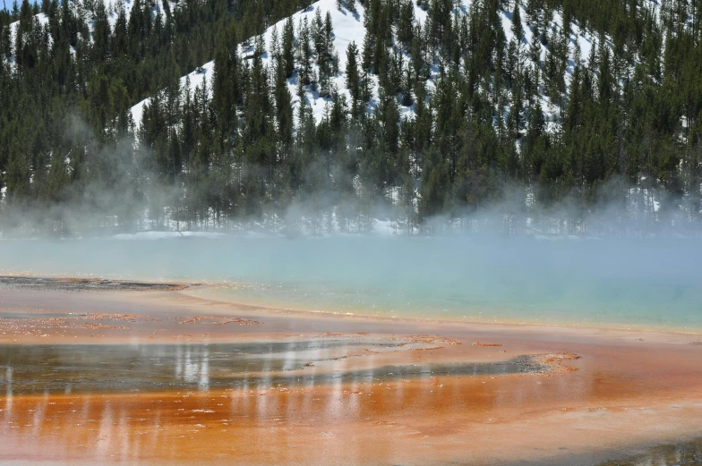 an image of  water with steam rising from it