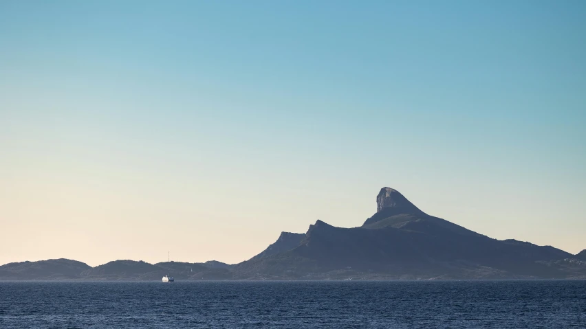 an island is shown off in the distance