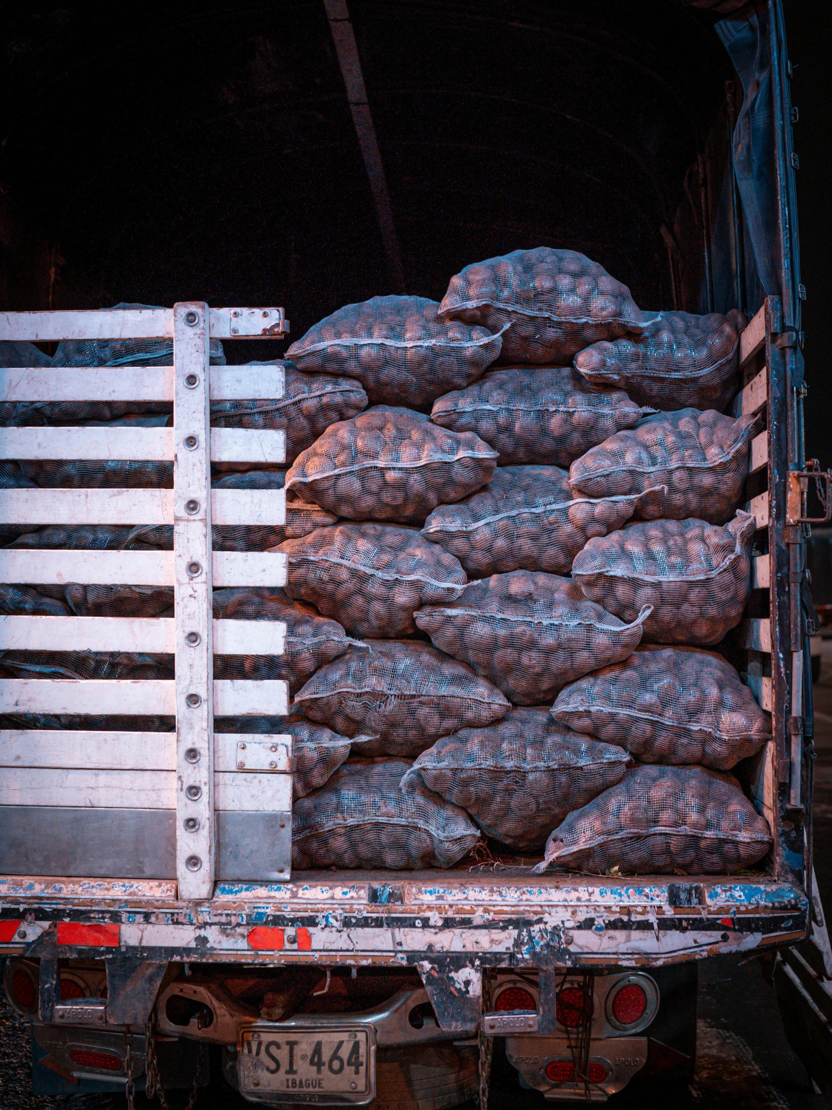 a truck is loaded with lots of baggies of goods