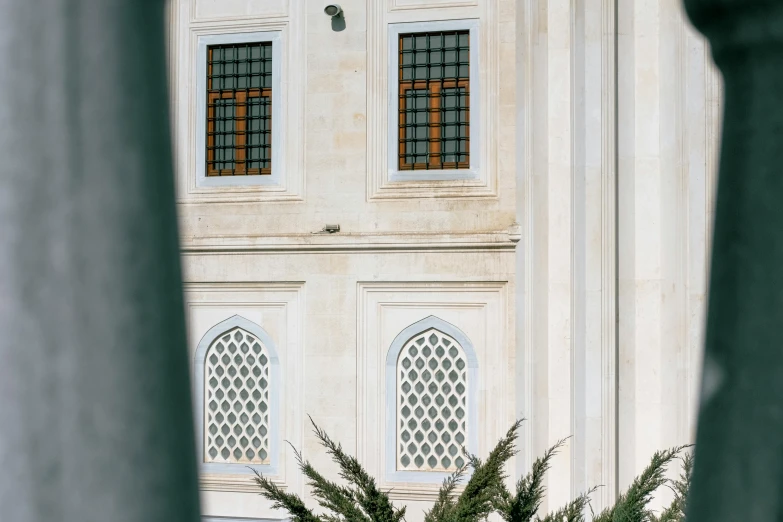 a building with arched windows on the outside